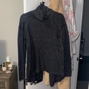 Open back turtle neck sweater